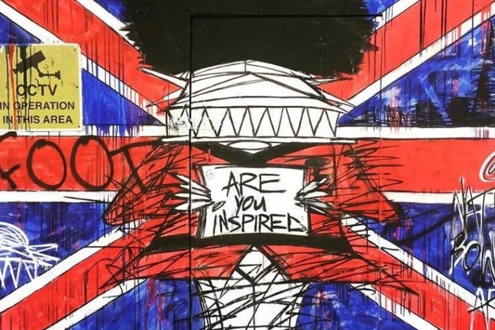 Street art of the UK flag with the words ´Are you Inspired?´ on it.